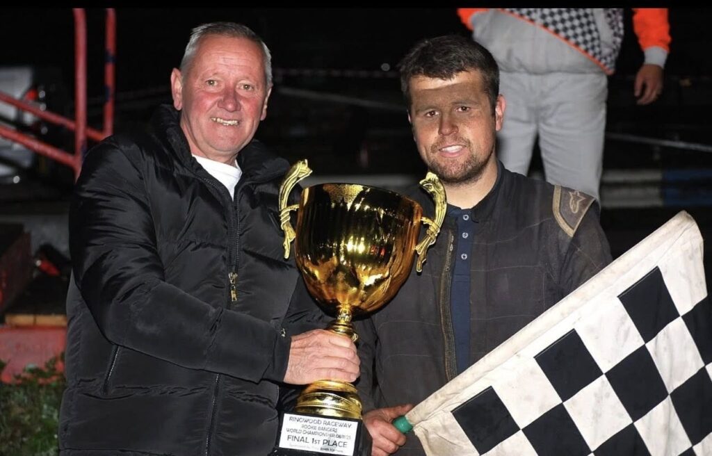 440 Macaulay Mills holding the first-place trophy after winning the 2025 Rookie Banger Championship of the World at Ringwood Raceway